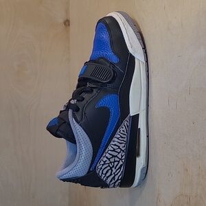 Nike Air Jordan Legacy 312 Low In The Black/Game Royal-White Colorway Sneakers